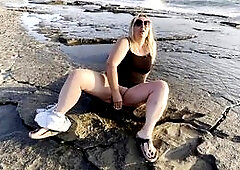 Blonde MILF Masturbates and Squirts on Public Beach