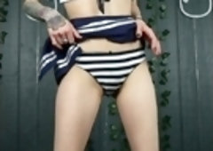 Small titted brunette Sharron with glasses masturbates