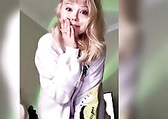Blond pulls her hoodie down slow with a smirk ?