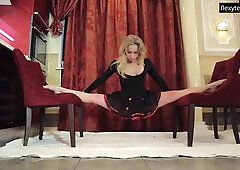 Russian gymnast Olesya Kisbeka does the splits and undresses at the same time