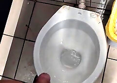 Cleaning a public restroom frosted in urine