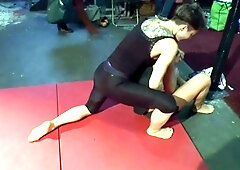 Tough girl wrestles older guy