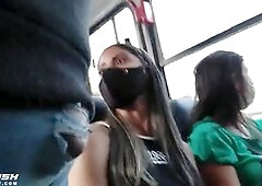 Girls looking ripped jeans bulge in bus