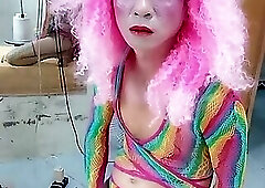 Transgender Le wears sexy clothes and plays cups of sex. Artificial cans
