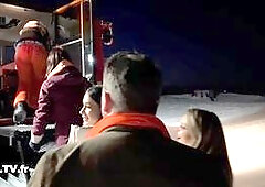 Nighttime ski slope threesome